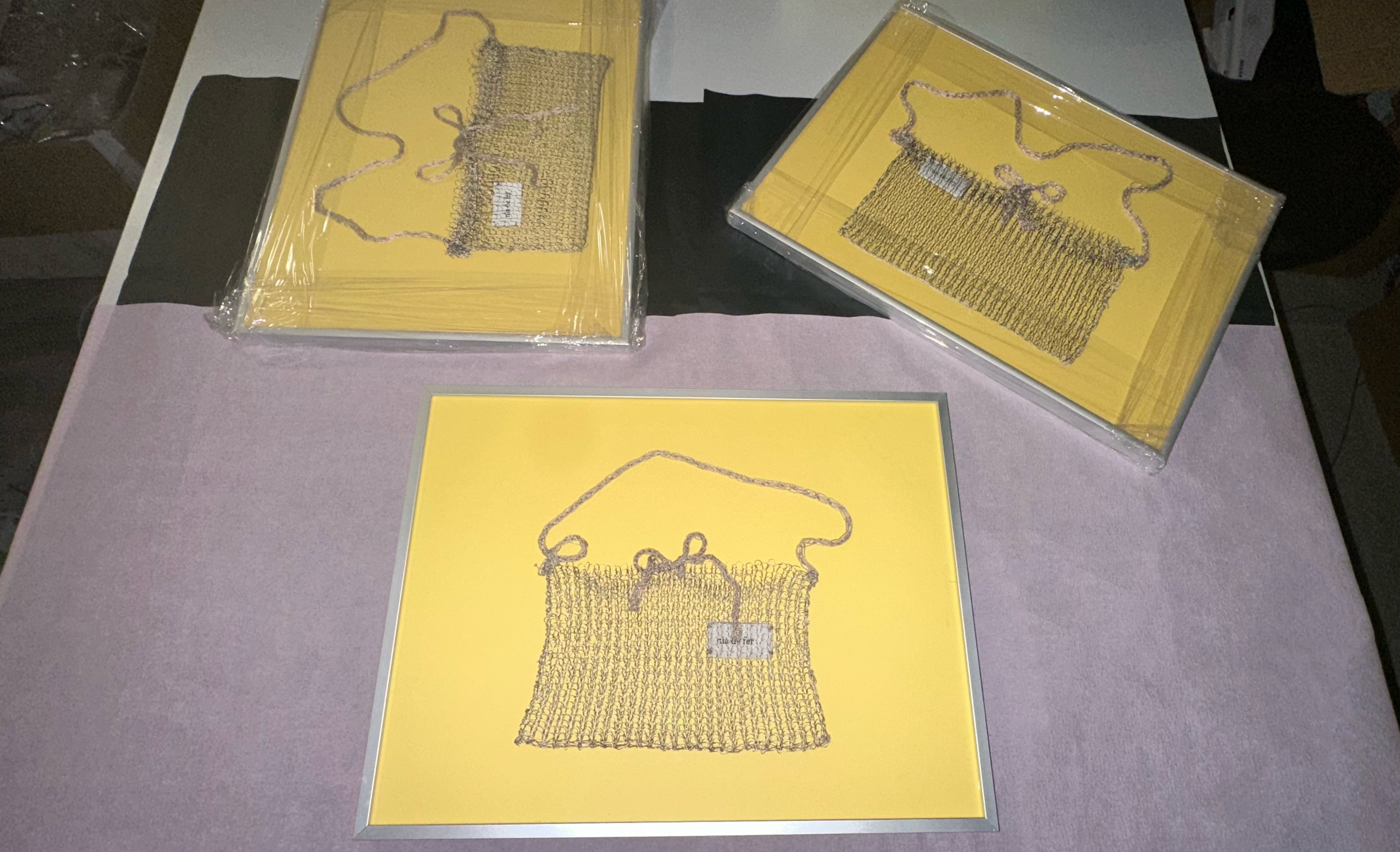 "framed metallic bag"